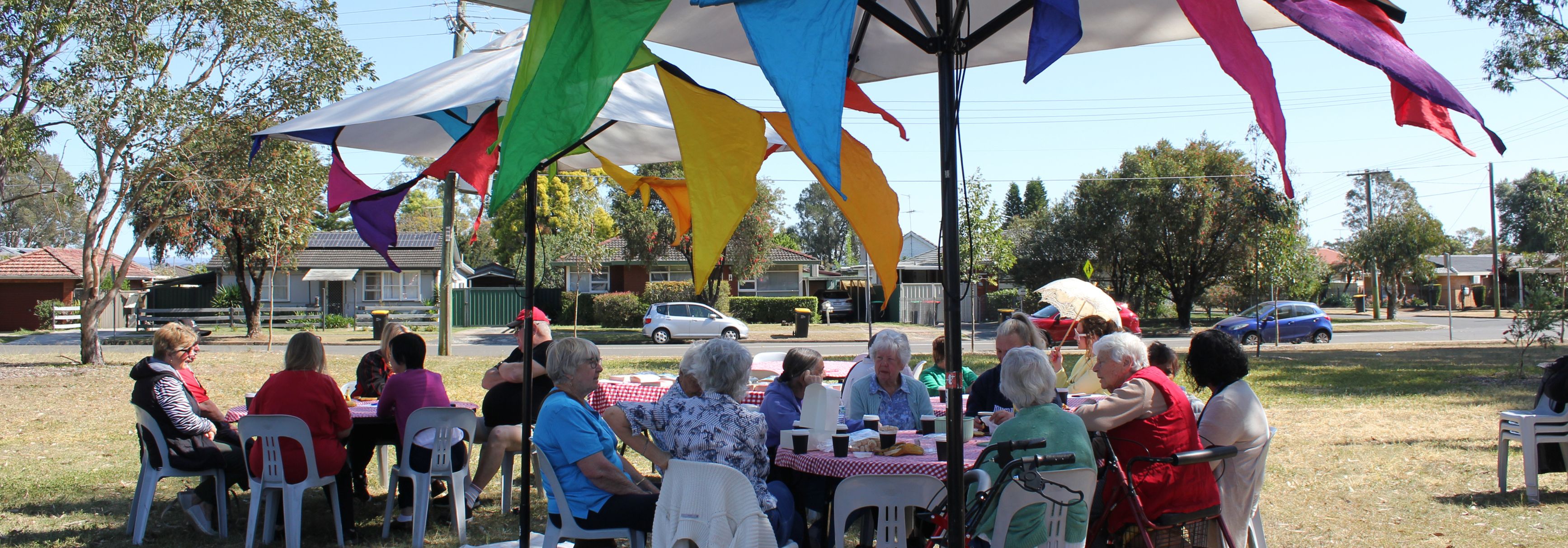 Group of people at outdoor cafe in park