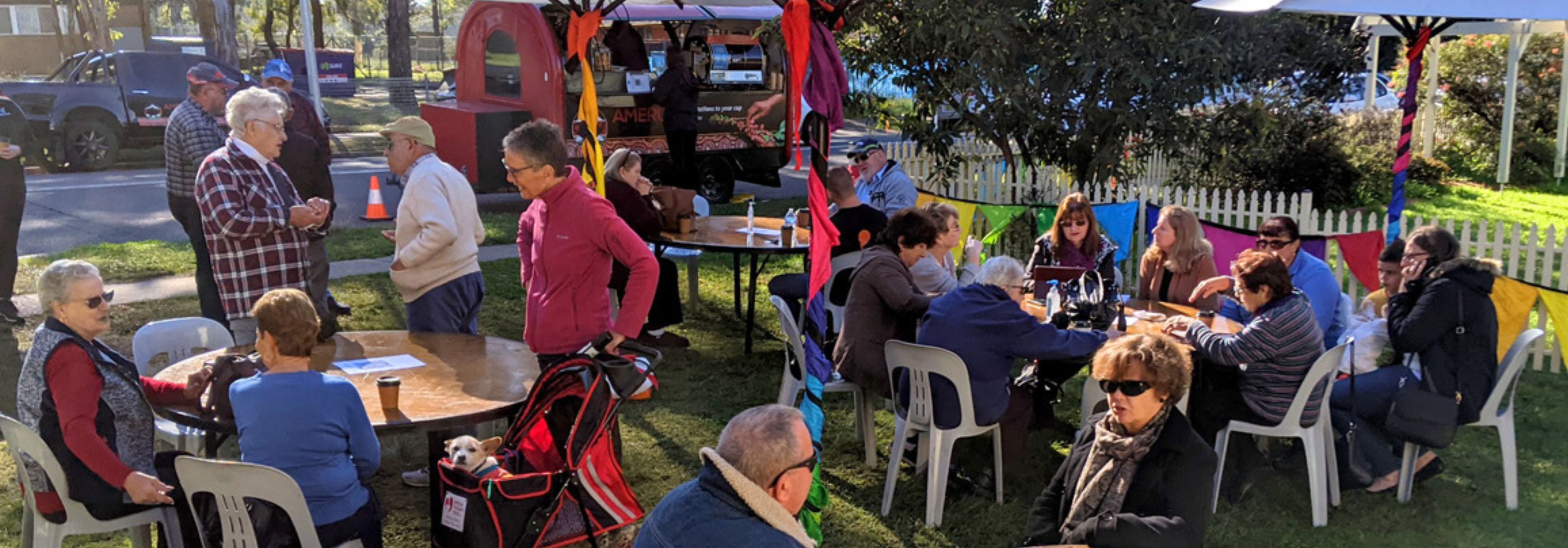 Group of people at outdoor cafe in park